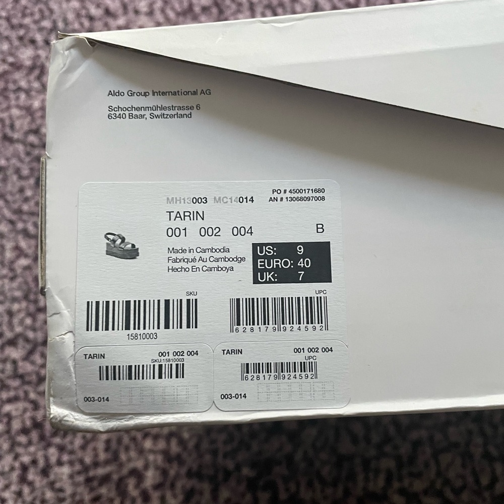 Brand new, never warn. Black Taryn platform sandals from Aldo.